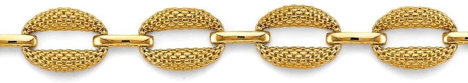 Gold chain with interlocking links on a white background available on the TX.ORO website.