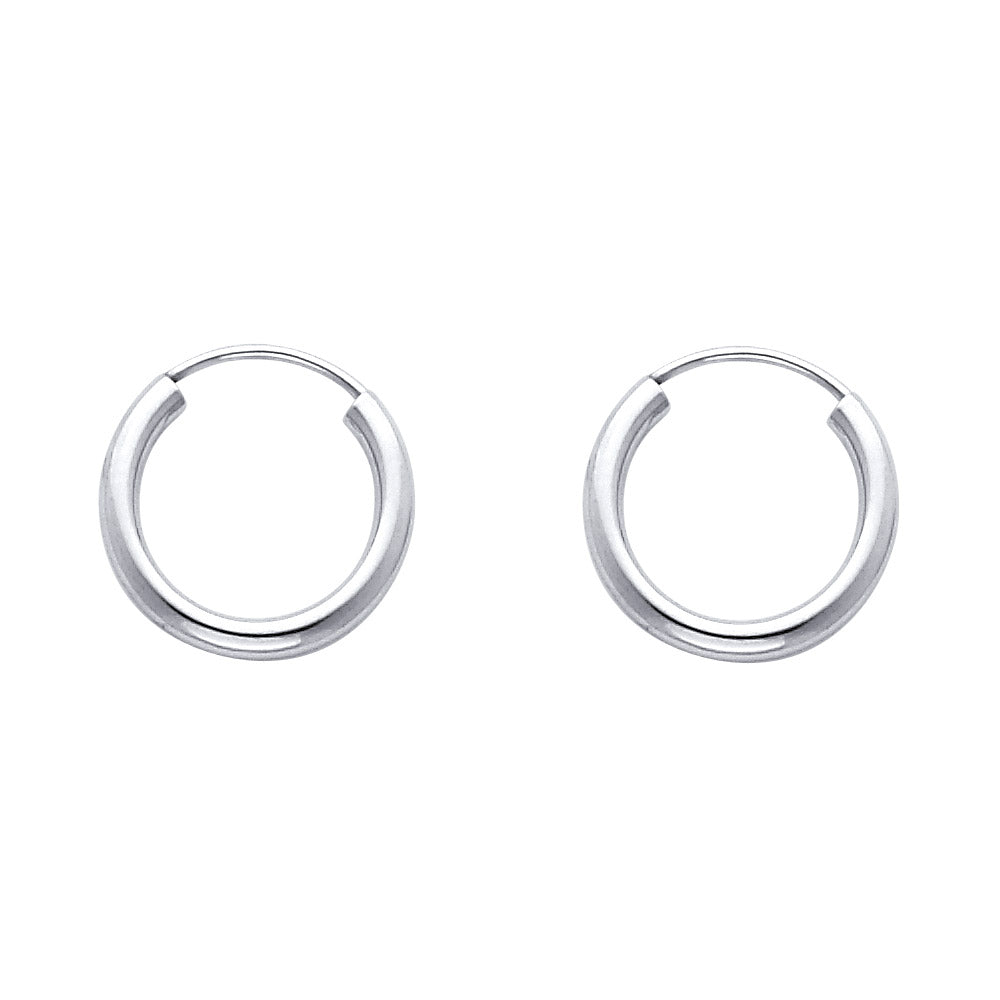 Pair of White Gold hoop earrings on a white background available on the TX.ORO website.