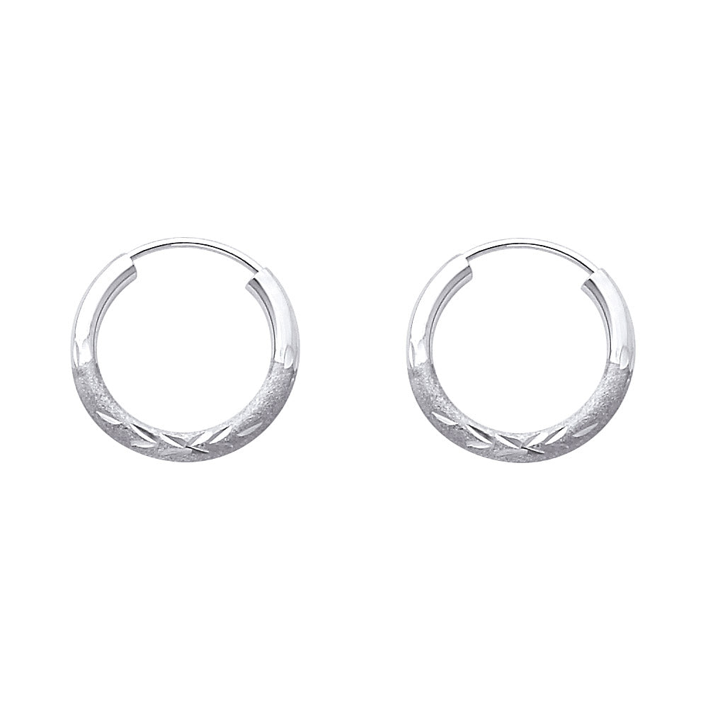 A Pair of White Gold hoop earrings on a white background available on the TX.ORO website.