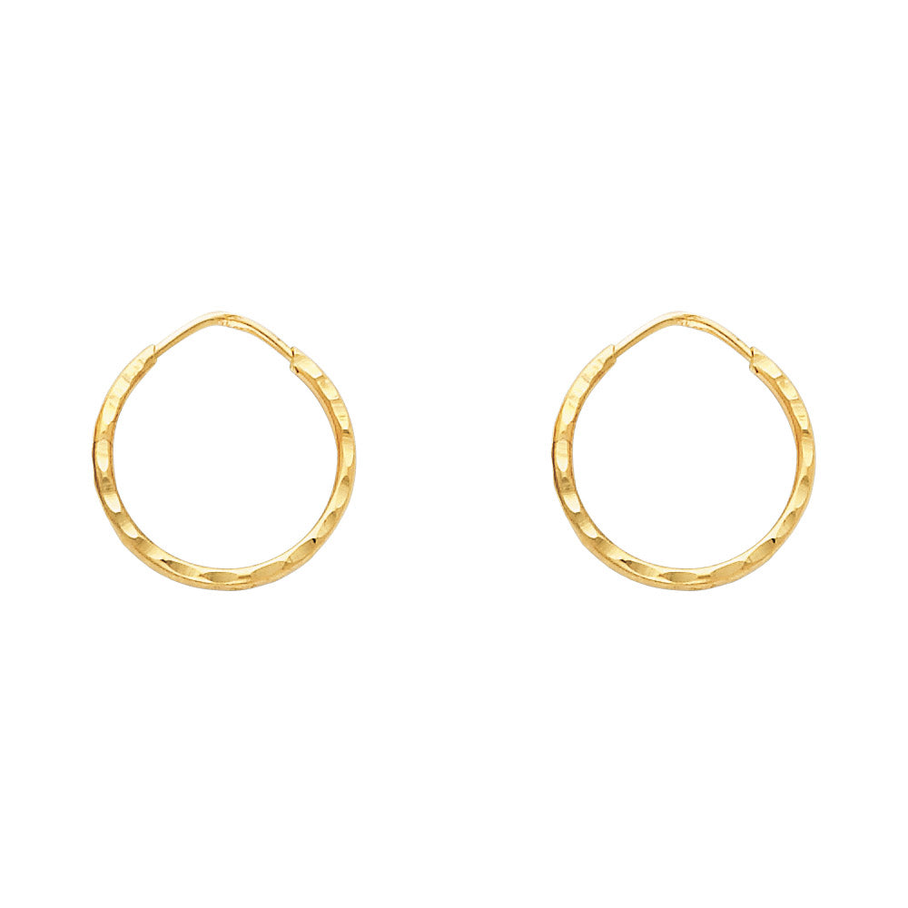 Gold hoop earrings on a white background available on the TX.ORO website.