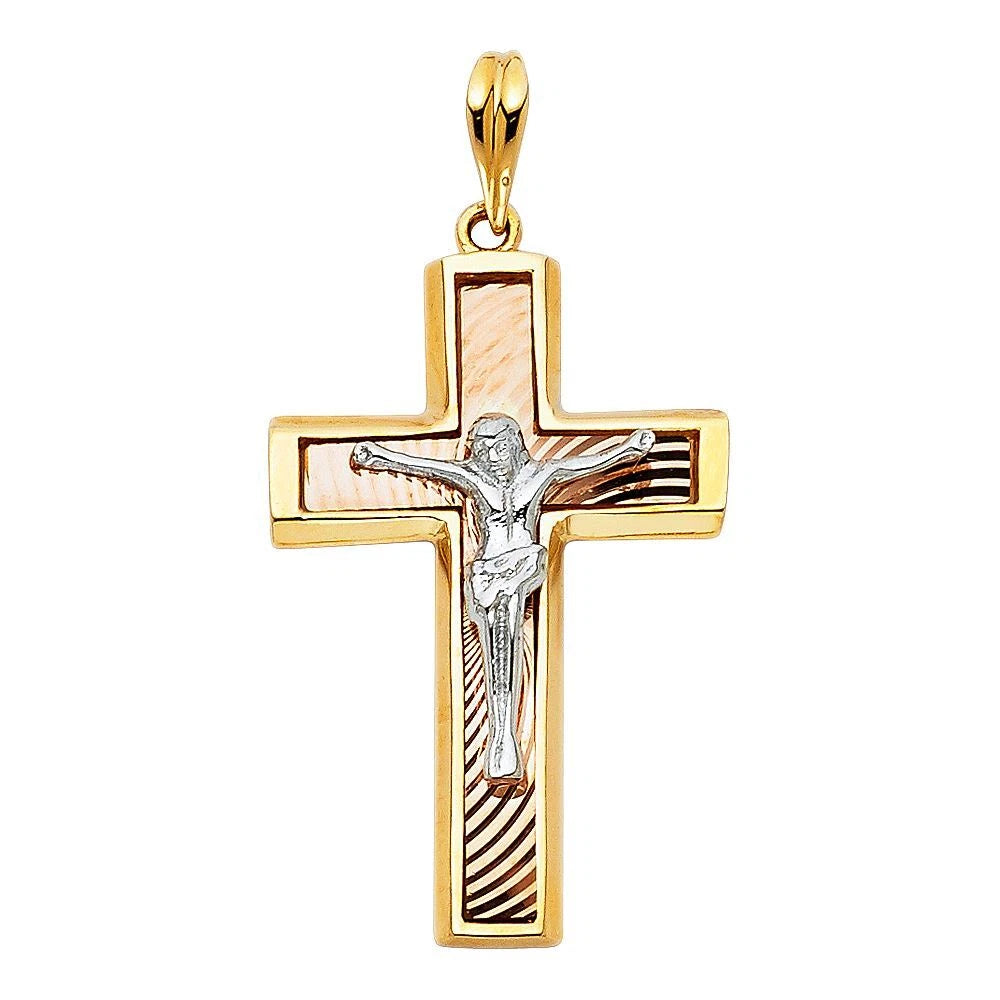 Gold and silver cross pendant with Jesus figure on a white background