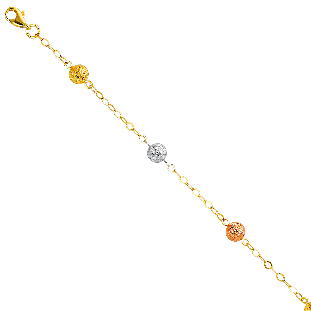 Gold bracelet with spherical charms on a white background available on the TX.ORO website.