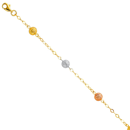 Gold bracelet with spherical charms on a white background available on the TX.ORO website.