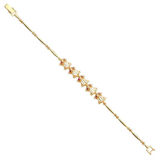 Gold bracelet with decorative elements on a white background available on the TX.ORO website.