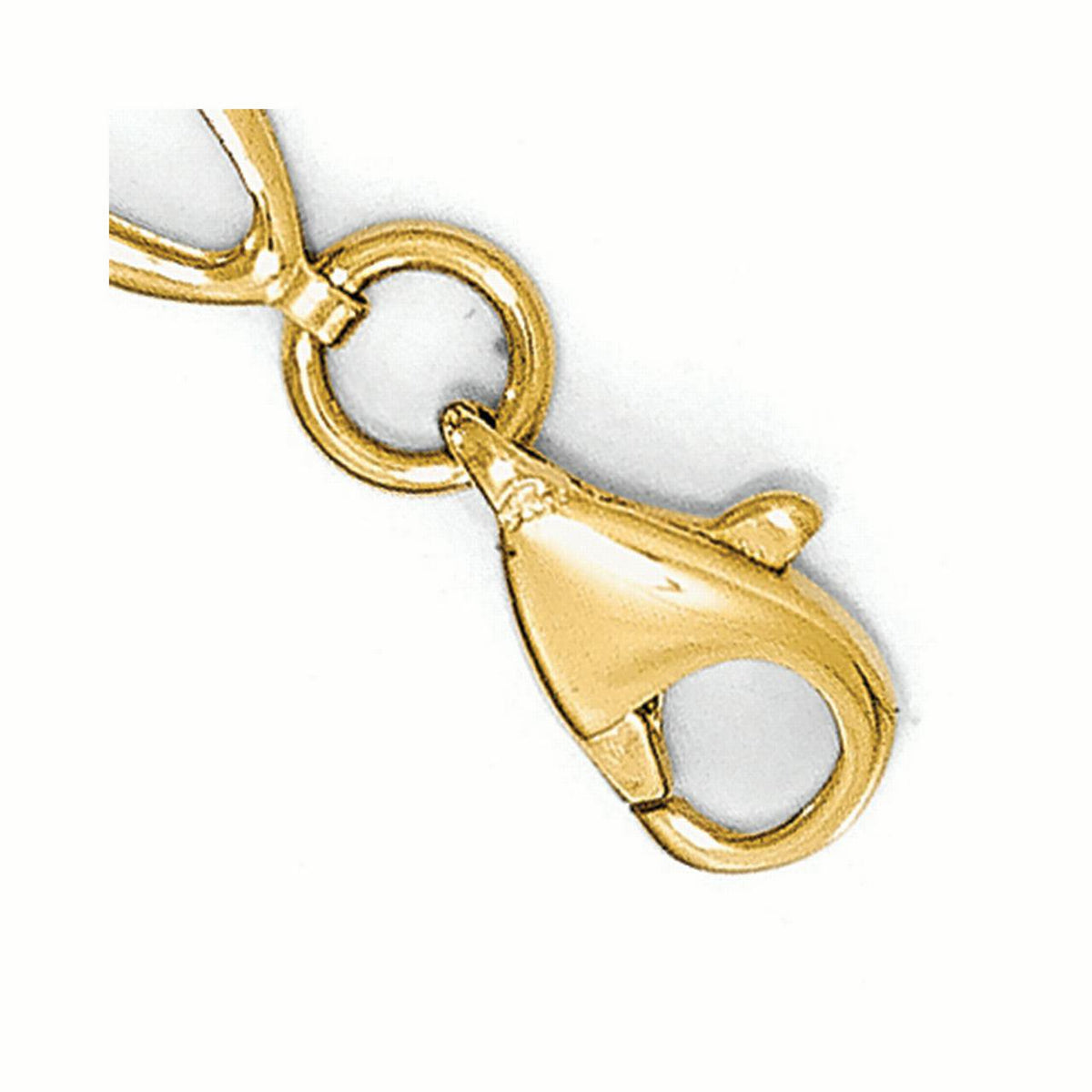 Gold dolphin charm on a white background available on the TX.ORO website.