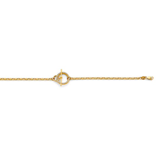 Gold bracelet with a heart clasp on a light background.