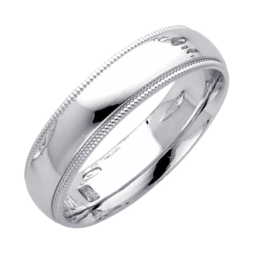 Silver ring with milgrain detailing on a white background