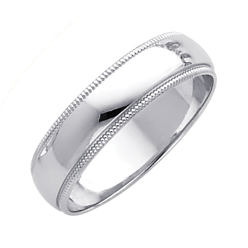 Silver ring with a milgrain design on a white background