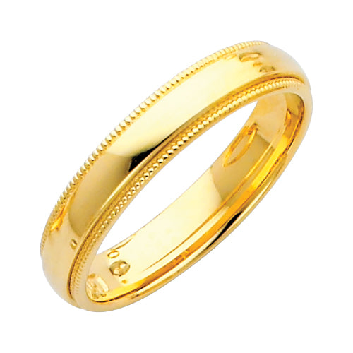 Gold ring with milgrain detailing on a white background