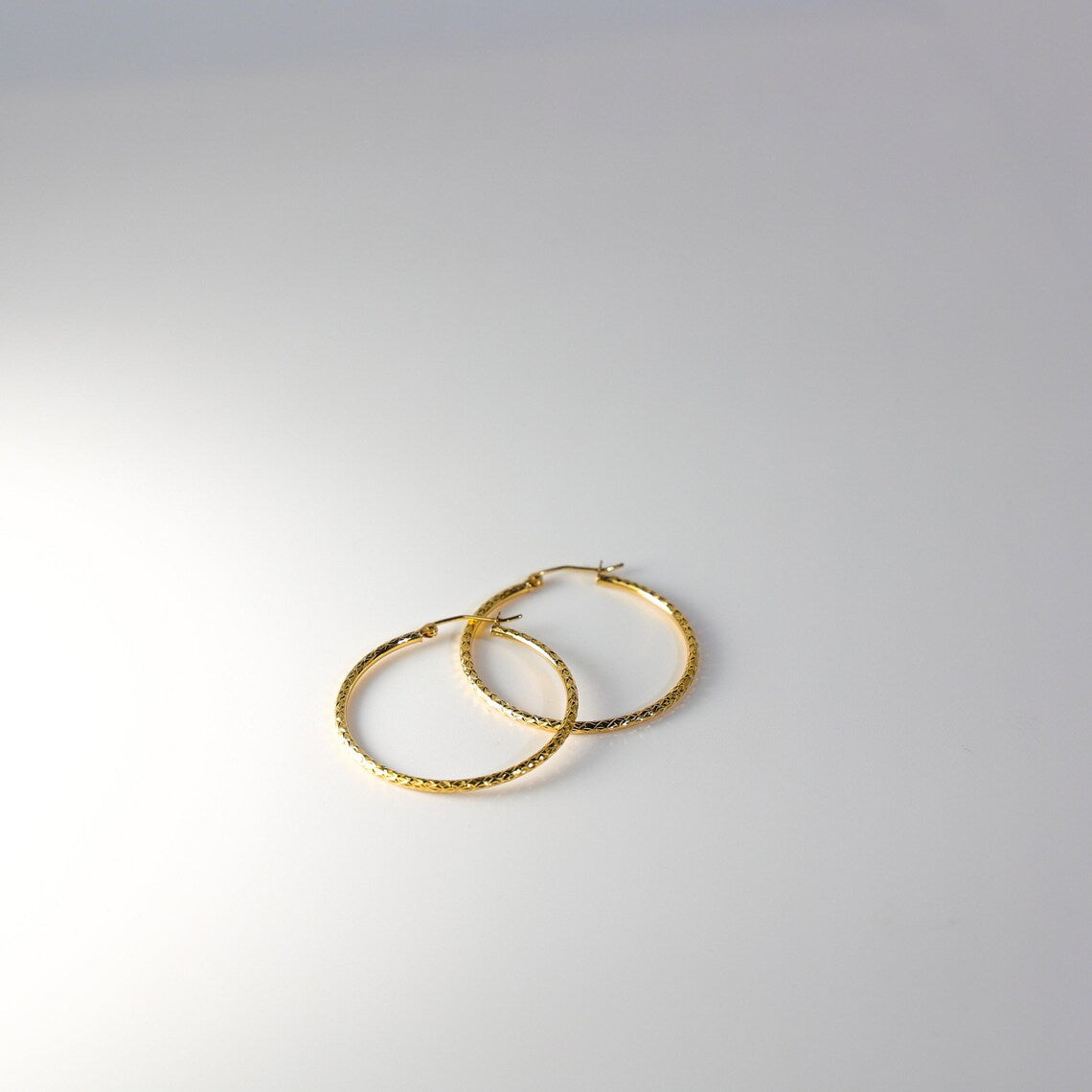 14K Yellow Gold Silk Diamond Cut 1.5mm Round Tube Hoop Earrings - Sizes 15mm to 35mm
