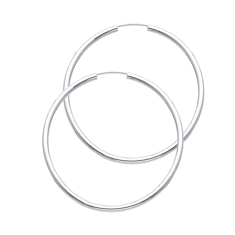 Two White Gold hoop earrings on a white background available on the TX.ORO website.