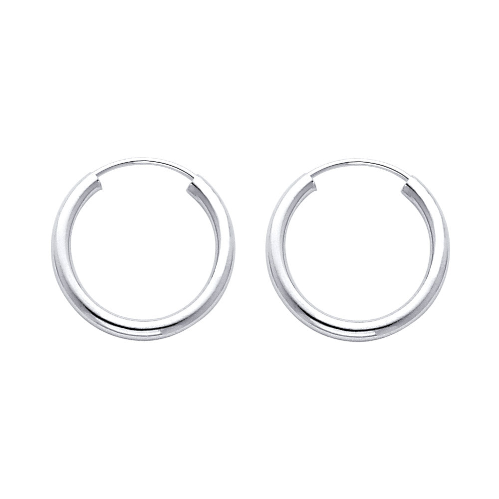 Pair of White Gold hoop earrings on a white background available on the TX.ORO website.
