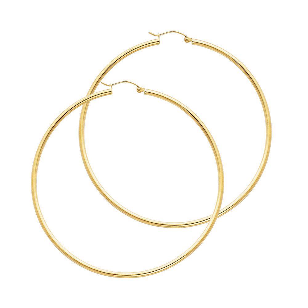 Pair of gold hoop earrings on a white background available on the TX.ORO website.
