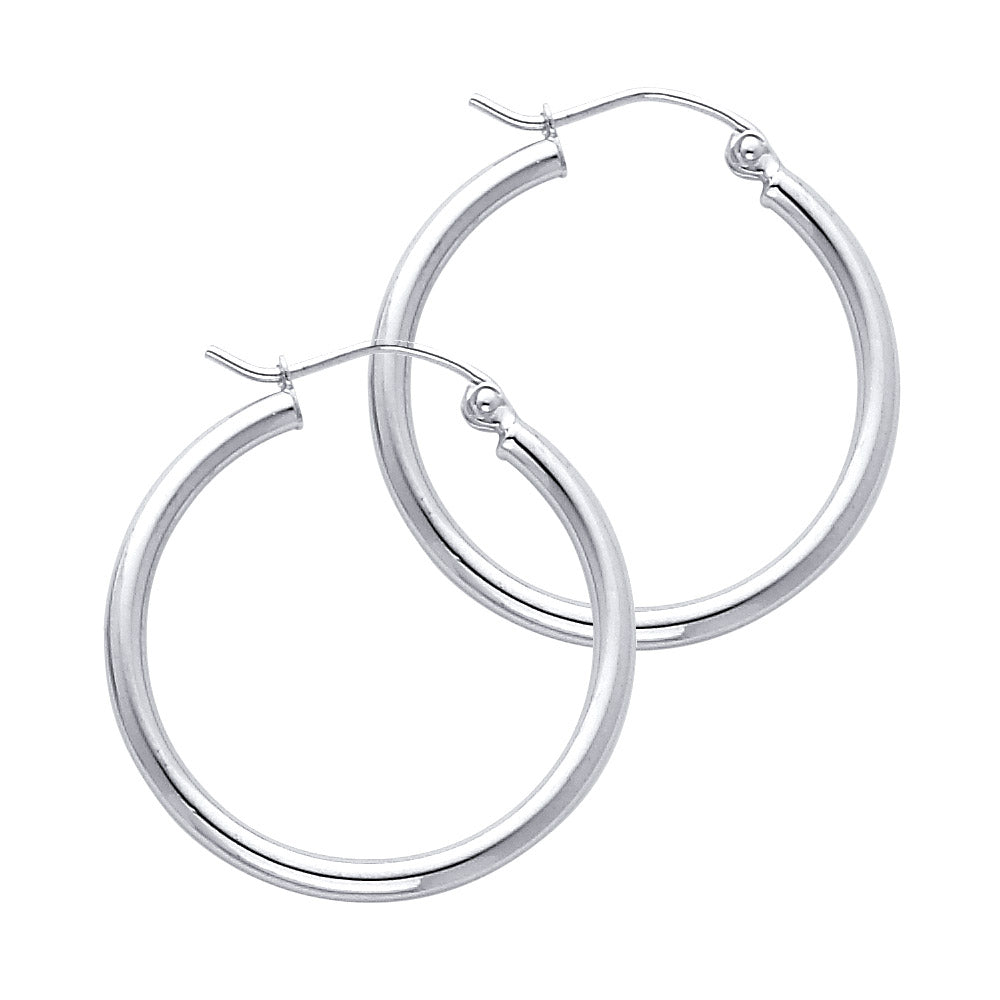 Pair of White Gold hoop earrings on a white background available on the TX.ORO website.