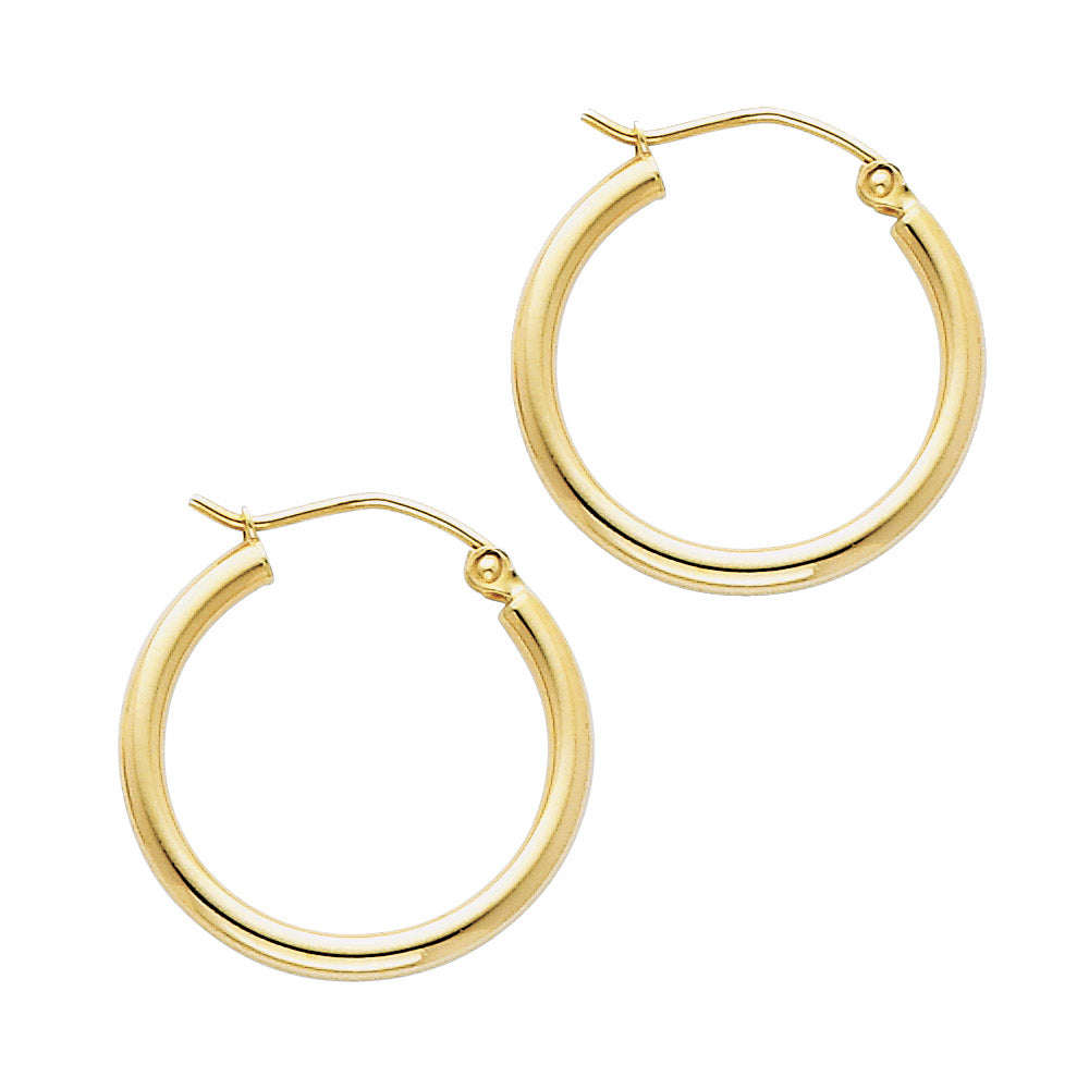 Gold hoop earrings on a white background available on the TX.ORO website.