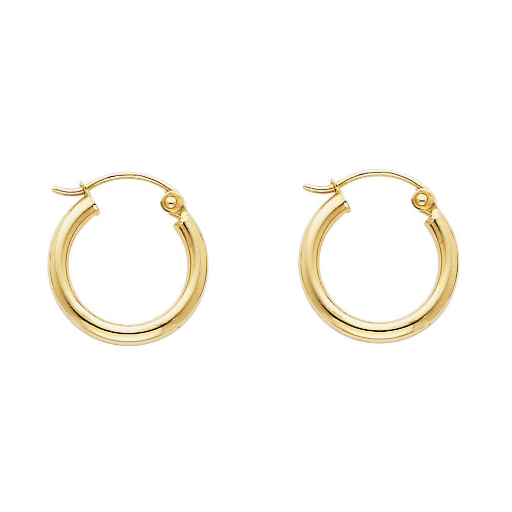 Gold hoop earrings on a white background available on the TX.ORO website.
