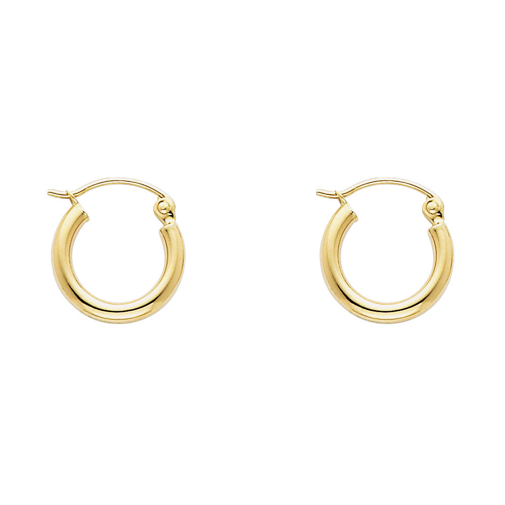 Gold hoop earrings on a white background available on the TX.ORO website.