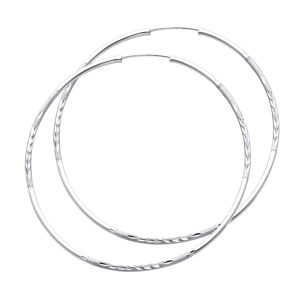 Pair of White Gold hoop earrings on a white background available on the TX.ORO website.