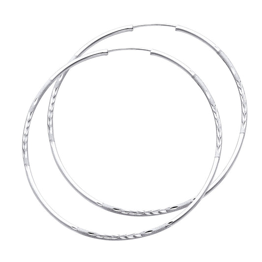 Pair of White Gold hoop earrings on a white background available on the TX.ORO website.