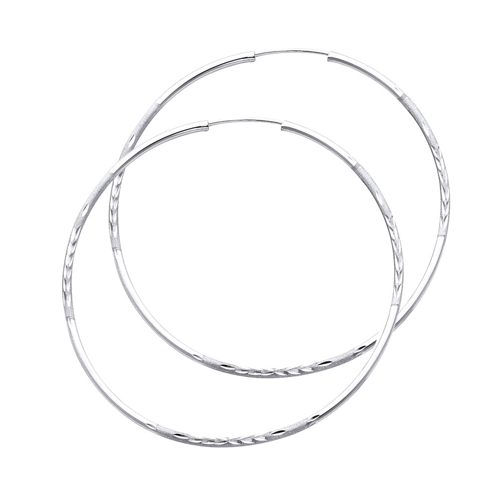 Pair of White Gold hoop earrings on a white background available on the TX.ORO website.