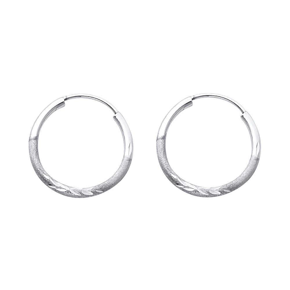 Pair of White Gold hoop earrings on a white background available on the TX.ORO website.