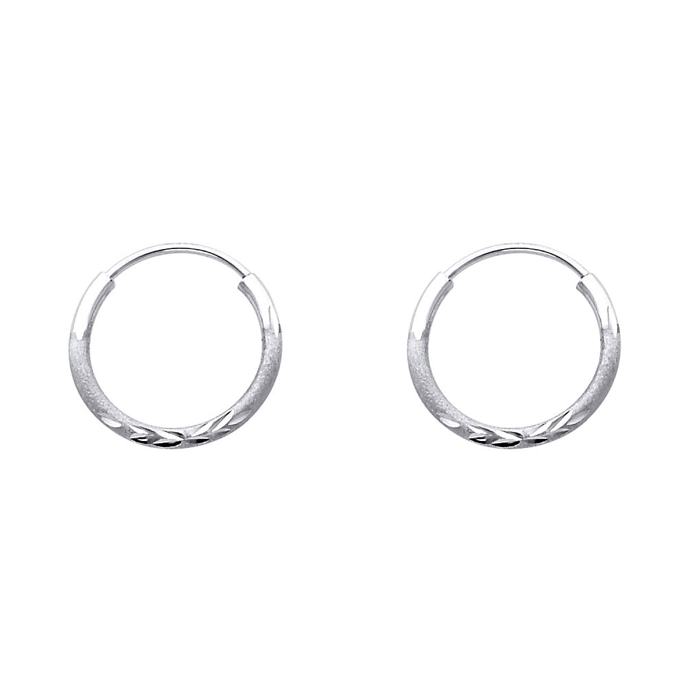 Pair of White Gold hoop earrings on a white background available on the TX.ORO website.