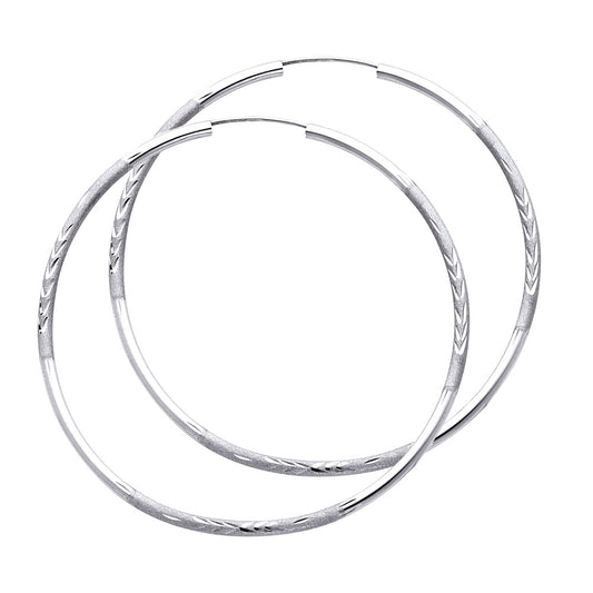 A Pair of White Gold hoop earrings on a white background available on the TX.ORO website.