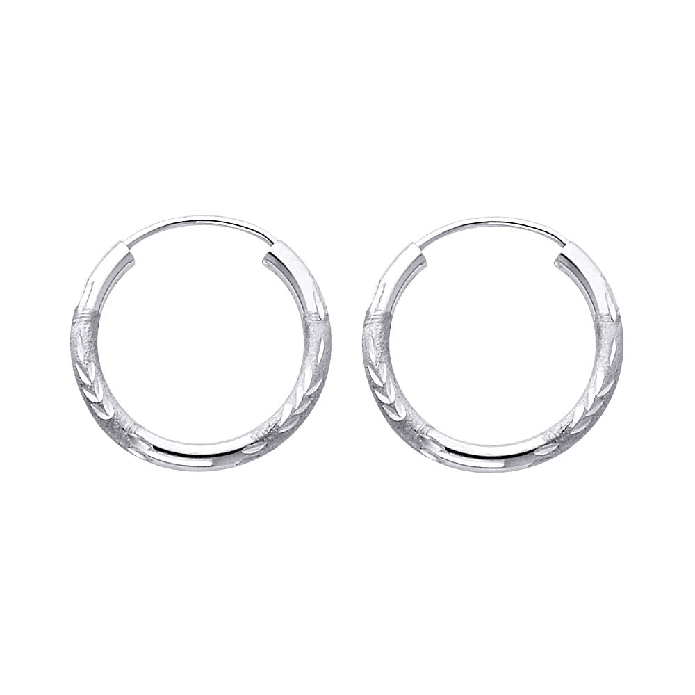 A Pair of White Gold hoop earrings on a white background available on the TX.ORO website.