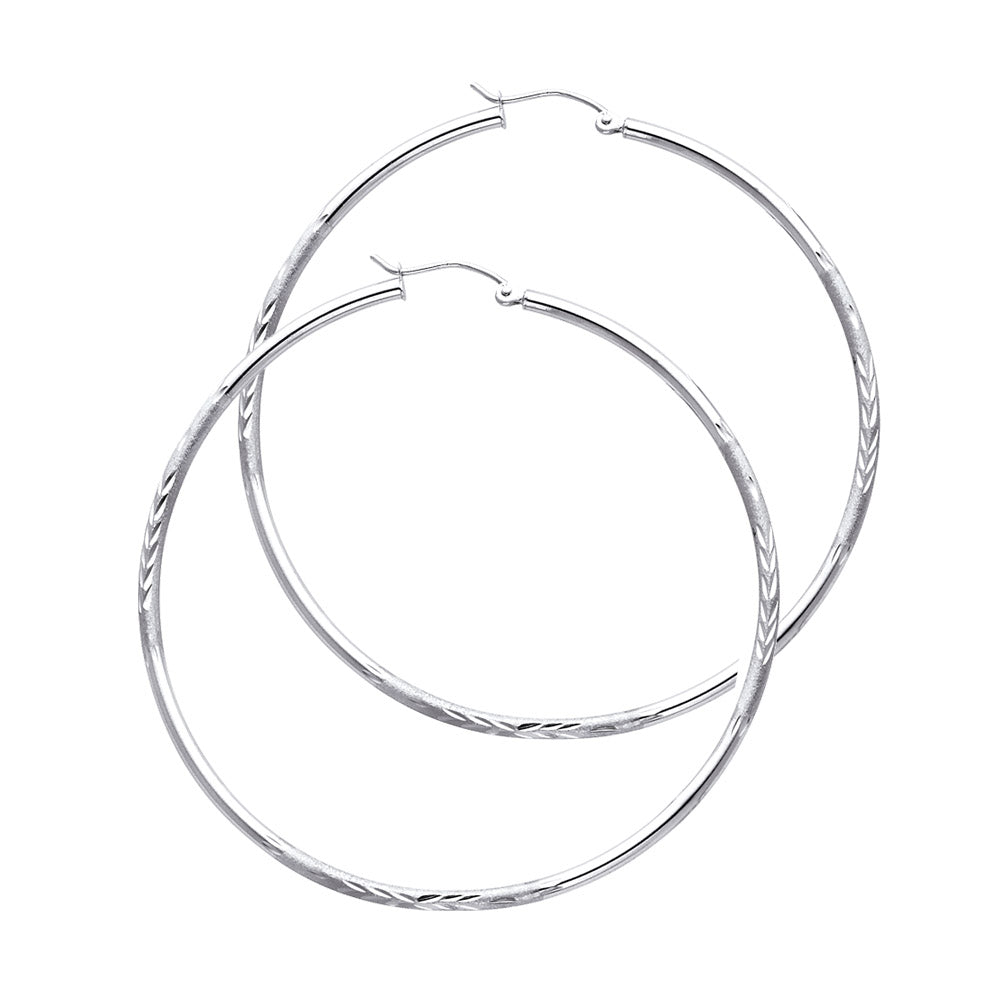 Pair of White Gold hoop earrings on a white background available on the TX.ORO website.