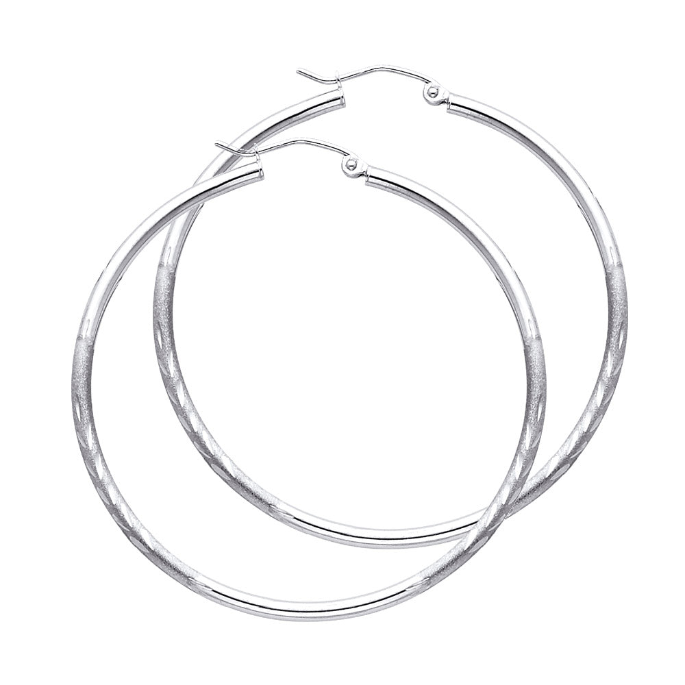 Pair of White Gold hoop earrings on a white background available on the TX.ORO website.
