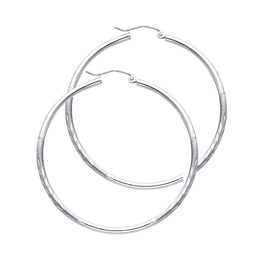 Pair of White Gold hoop earrings on a white background available on the TX.ORO website.