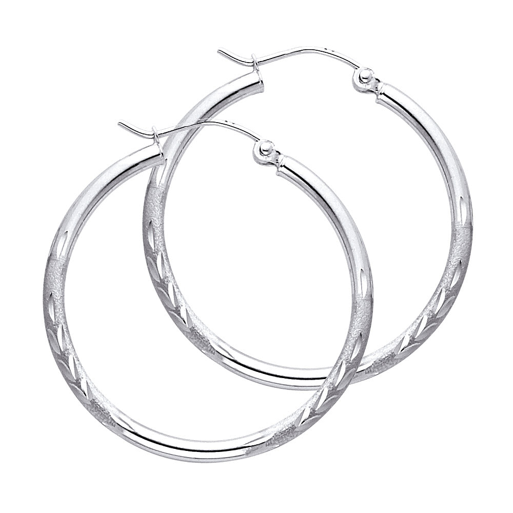 Pair of White Gold hoop earrings on a white background available on the TX.ORO website.