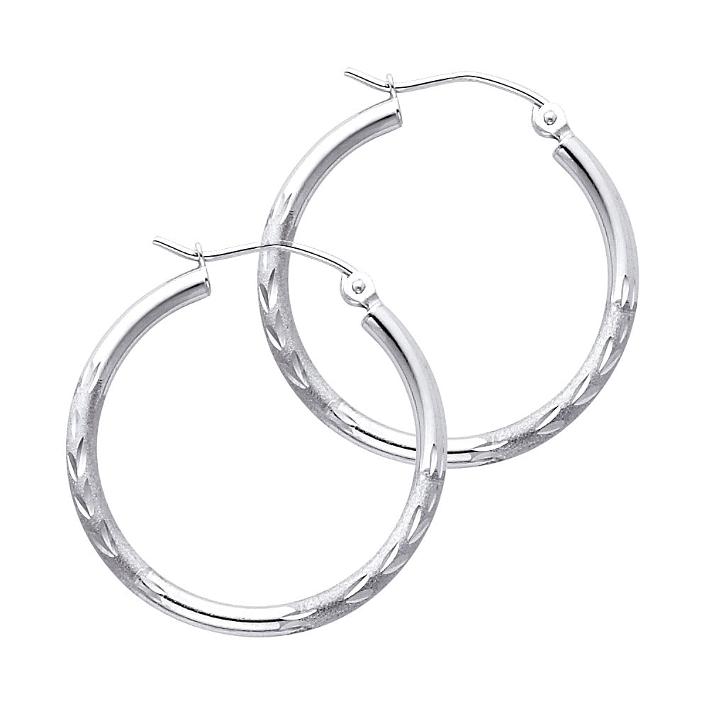 Pair of White Gold hoop earrings on a white background available on the TX.ORO website.