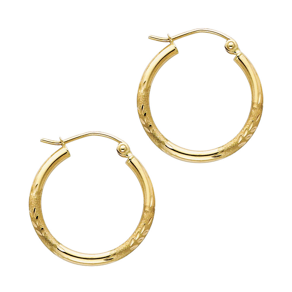 Gold hoop earrings on a white background available on the TX.ORO website.