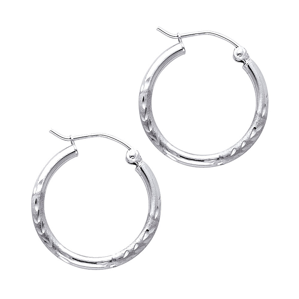 Pair of White Gold hoop earrings on a white background available on the TX.ORO website.
