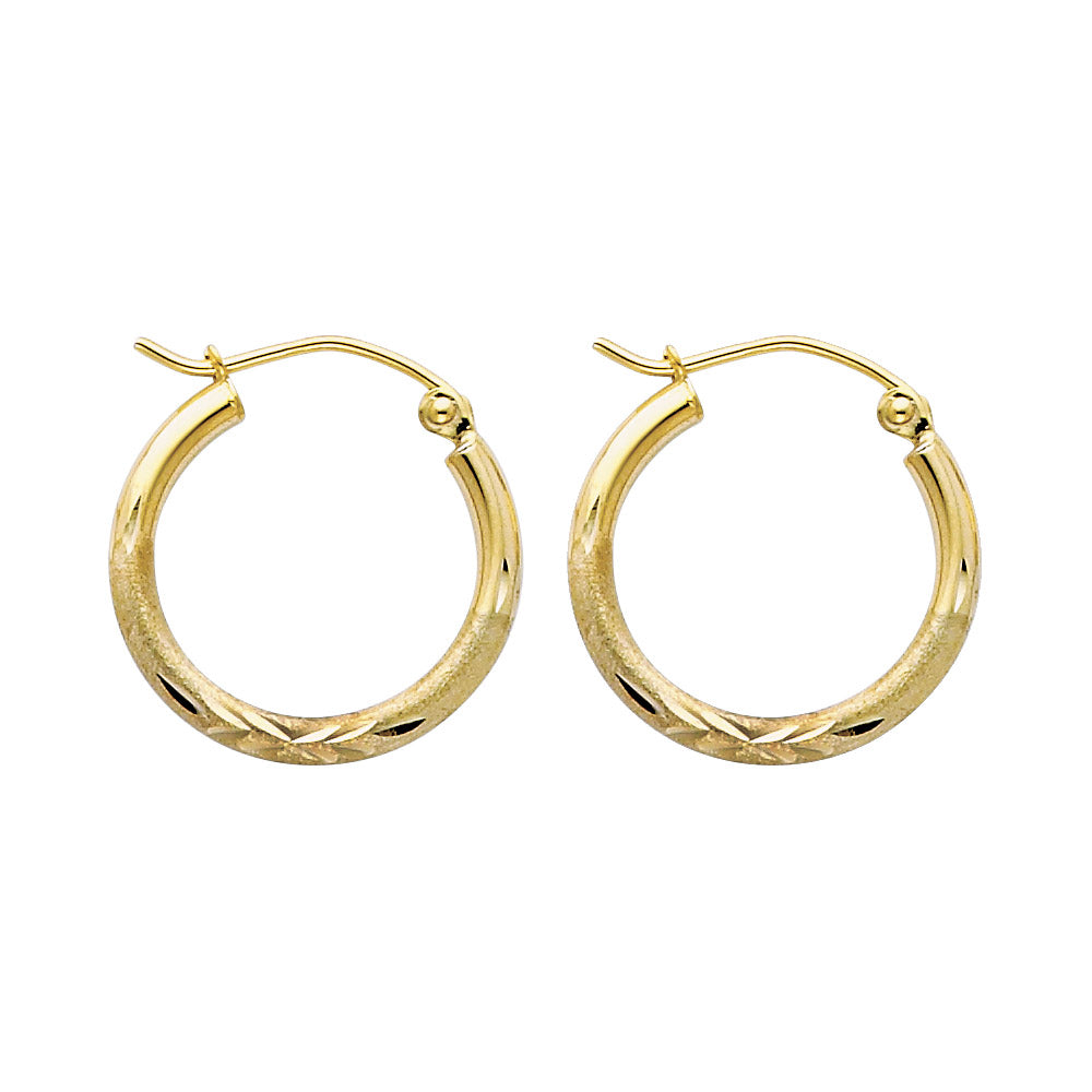 Gold hoop earrings on a white background available on the TX.ORO website.