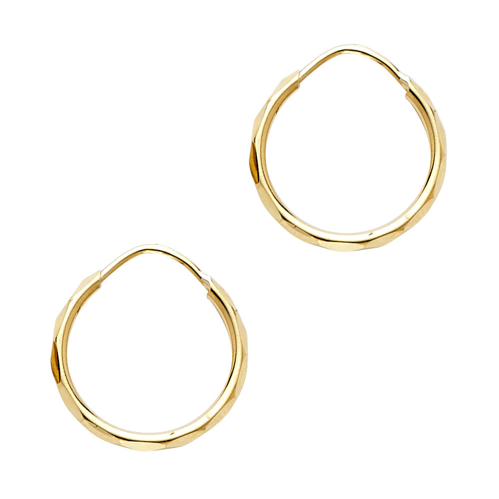 Gold hoop earrings on a white background.