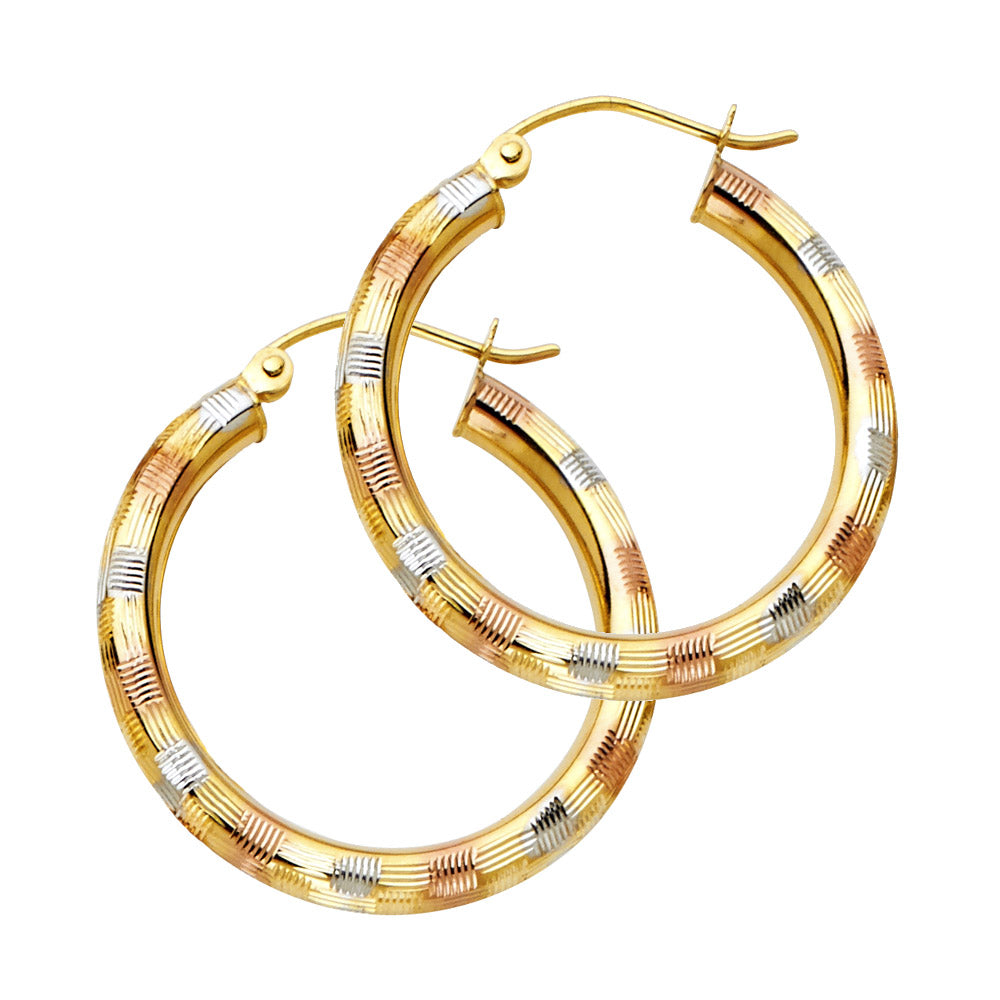 Pair of gold hoop earrings with a textured design on a white background available on the TX.ORO website.