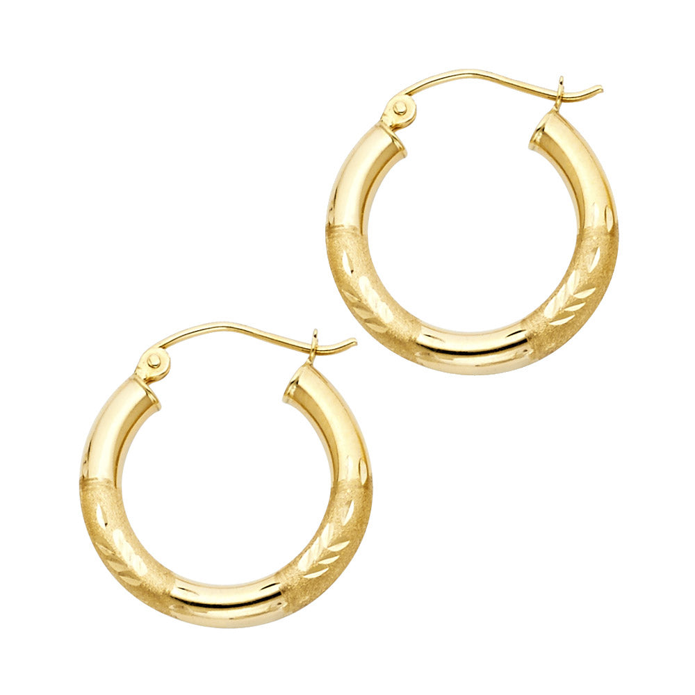 Gold hoop earrings on a white background Gold hoop earrings on a white background available on the TX.ORO website.