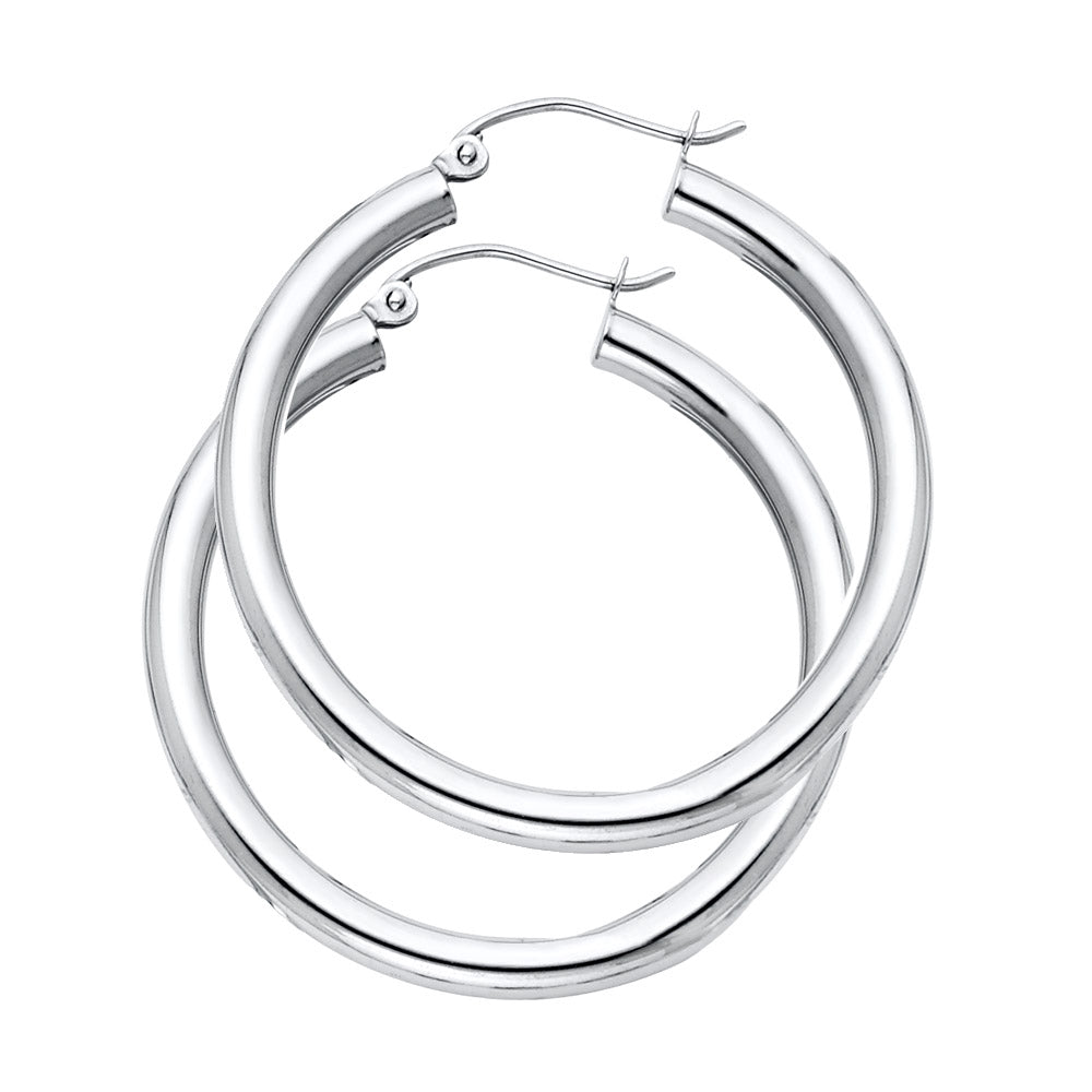 A Pair of White Gold hoop earrings on a white background available on the TX.ORO website.