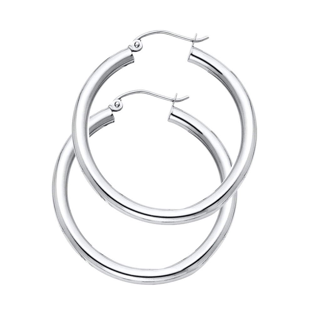 A Pair of White Gold hoop earrings on a white background available on the TX.ORO website.