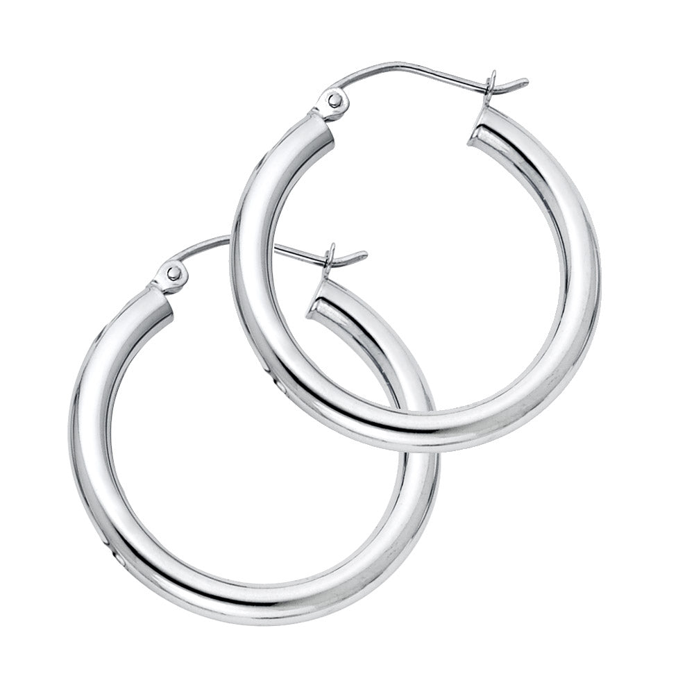A Pair of White Gold hoop earrings on a white background available on the TX.ORO website.