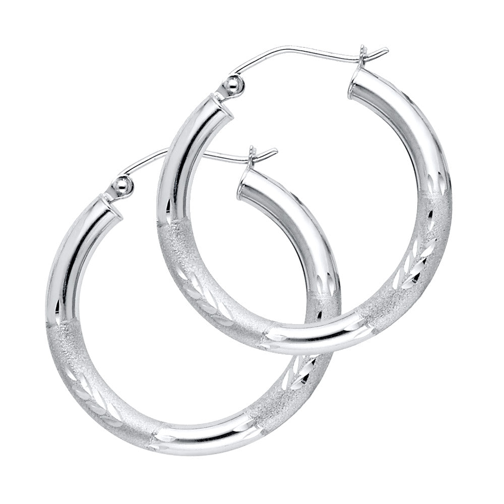 Pair of White Gold hoop earrings on a white background available on the TX.ORO website.