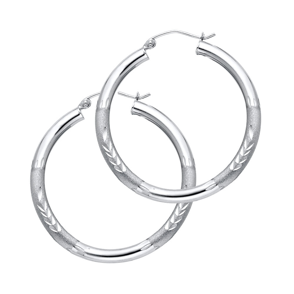 Pair of White Gold hoop earrings on a white background available on the TX.ORO website.