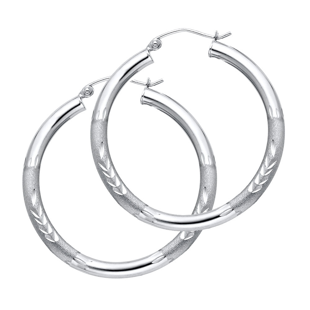 Pair of White Gold hoop earrings on a white background available on the TX.ORO website.