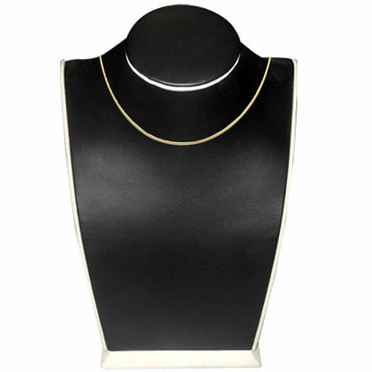 Black jewelry display bust with a gold necklace on a white background availabe on TX.ORO website
