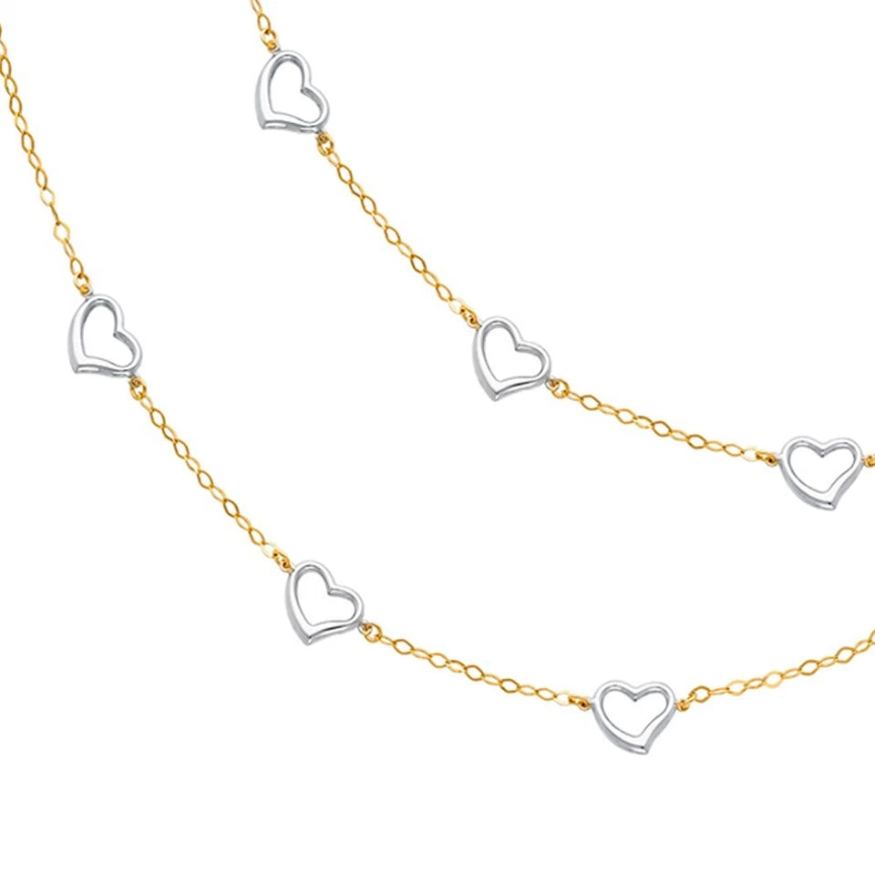 Necklace with heart-shaped pendants on a white background available on the TX.ORO website.
