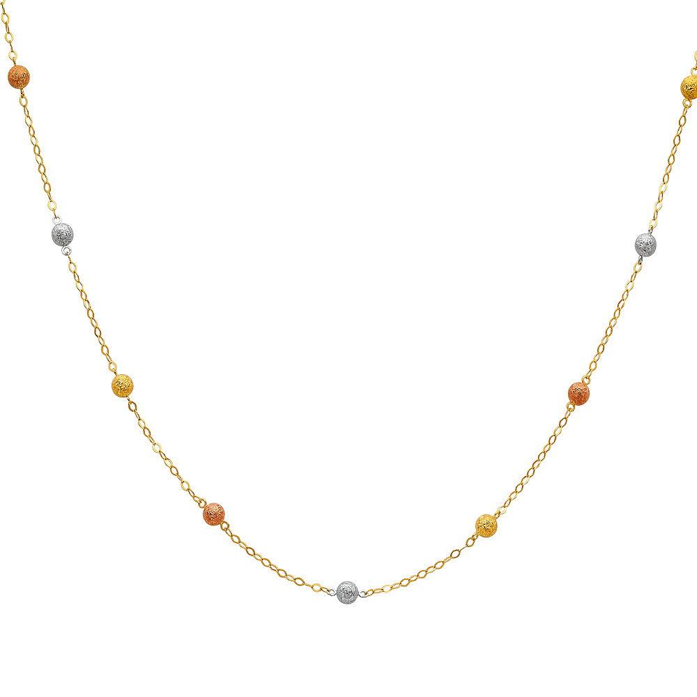 Gold necklace with small beads on a white background available on the TX.ORO website.