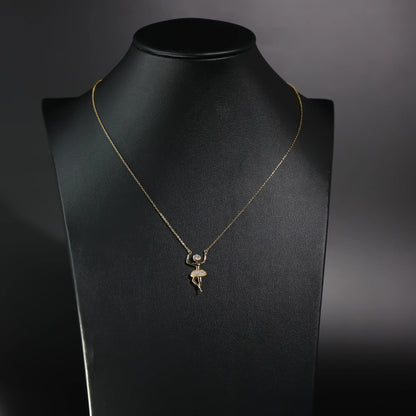 Gold necklace with a pendant on a black mannequin bust against a dark background available on the TX.ORO website.
