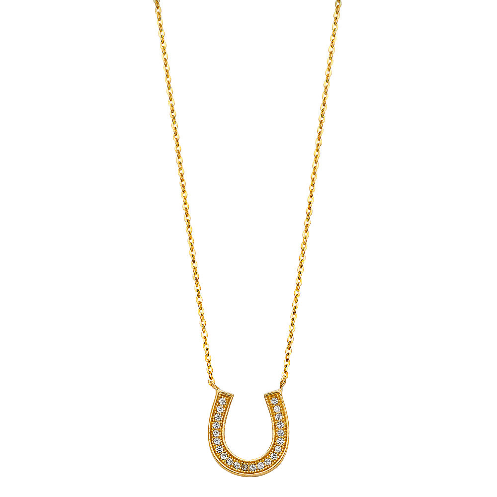 Gold necklace with a horseshoe-shaped pendant on a white background